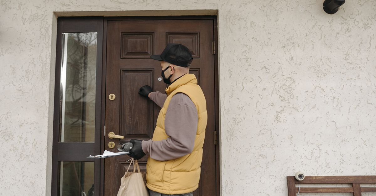 locksmith unlocking front door — McKinley Locksmith